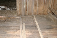 Those boards on the floor indicate where the joists are to keep from falling through!