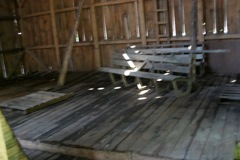 Front of the barn before it was re-done.  Note, the floor on the left of the picture is so rotten you can't walk anywhere except on the pallet.