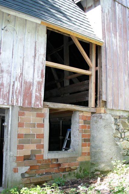 View from outside of the barn showing the repair... next step is new siding and batten boards.